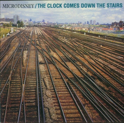 MICRODISNEY - The Clock Comes Down The Stairs