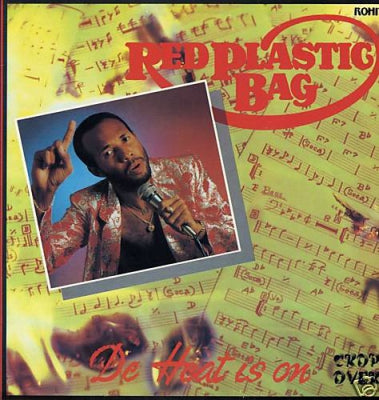 RED PLASTIC BAG - De Heat Is On