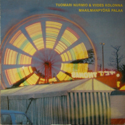 TUOMARI NURMIO & VIIDES KOLONNA - Maailmanpyörä Palaa