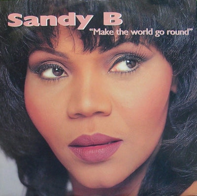 SANDY B - Make The World Go Round