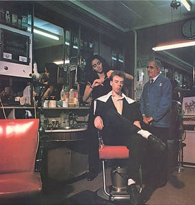 MOMUS - The Hairstyle Of The Devil