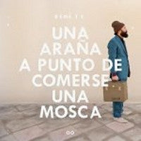 REMATE - Una arana a punto de comerse una mosca